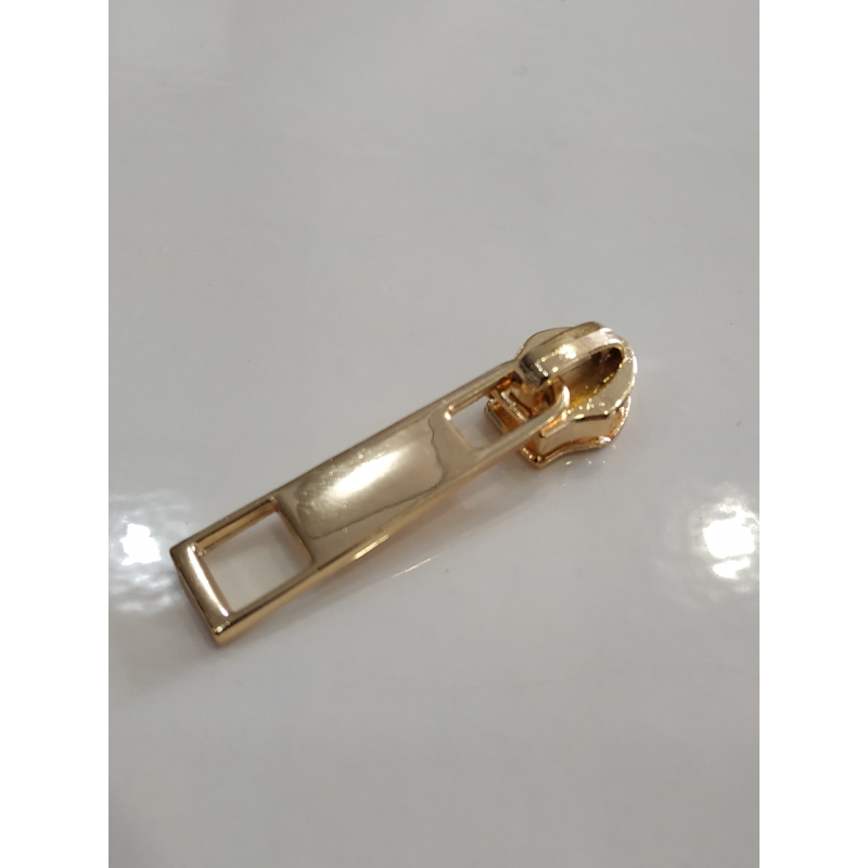 Бігунок сумковий без фіксатора на спіральну блискавку No5 золото Бігунок сумковий без фіксатора на спіральну блискавку No5 золото